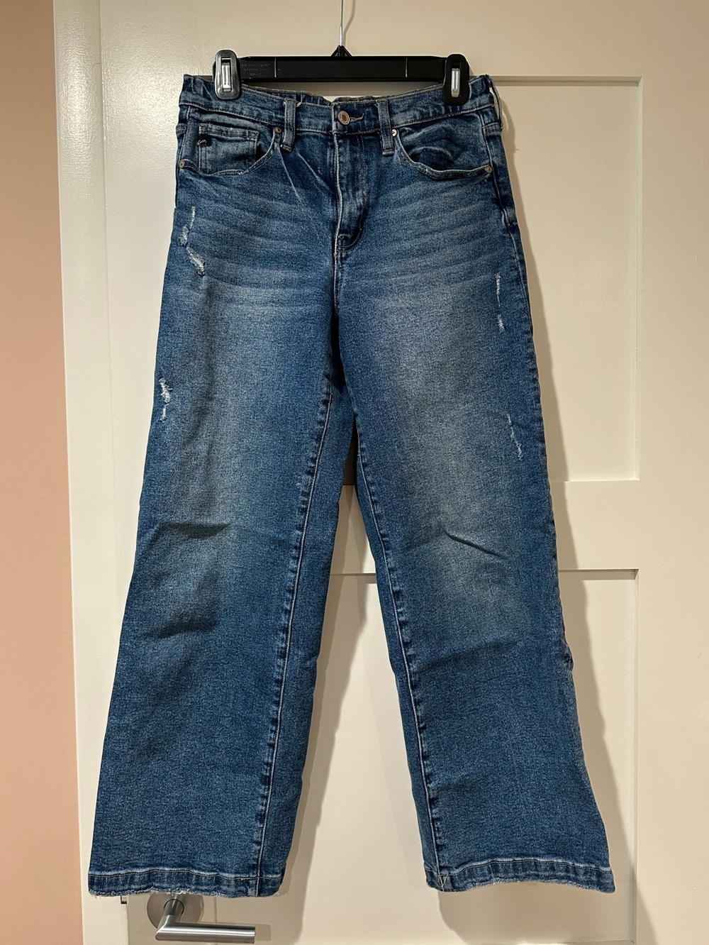 Kancan size 5/26 wide leg jean, minimal distressing.